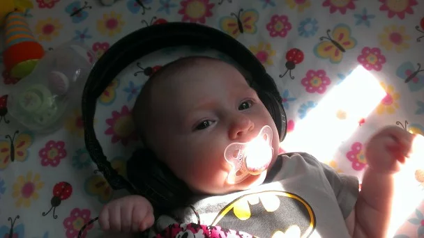 Riddim on-ear headphones on baby - they were not plugged in as a note, do not worry about my daughter's ears