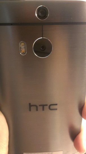 HTC One M8 in Paul's hand fucusing on the HTC One M8 Camera