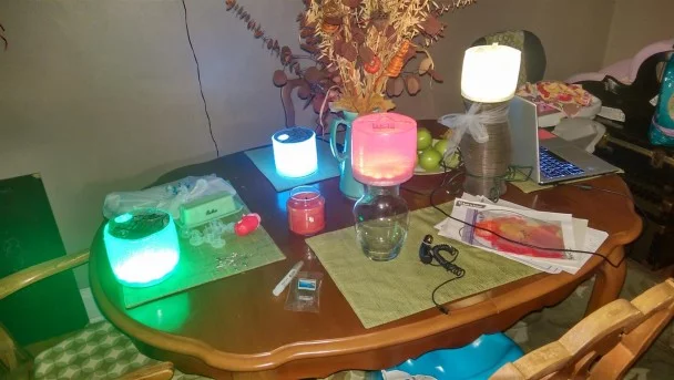 Several Luci products lighting a room