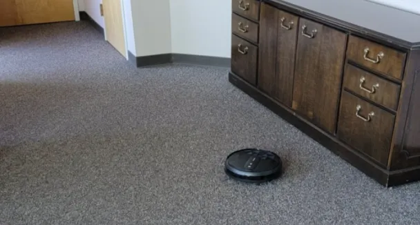 AIRROBO P20 Robot Vacuum Cleaner in a closed office