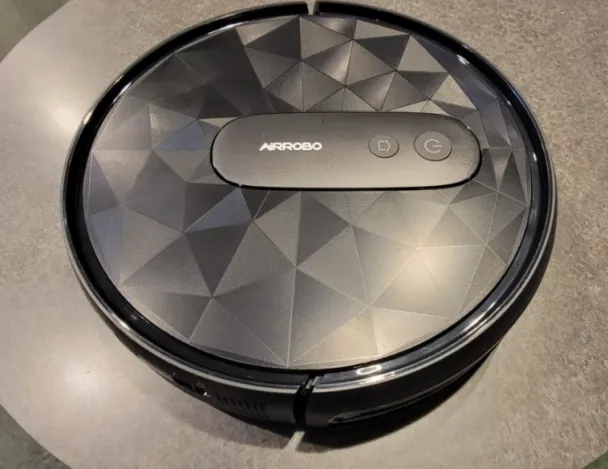 AIRROBO P20 Robot Vacuum Cleaner with the triangular reflective patterns on it makes for an interesting view